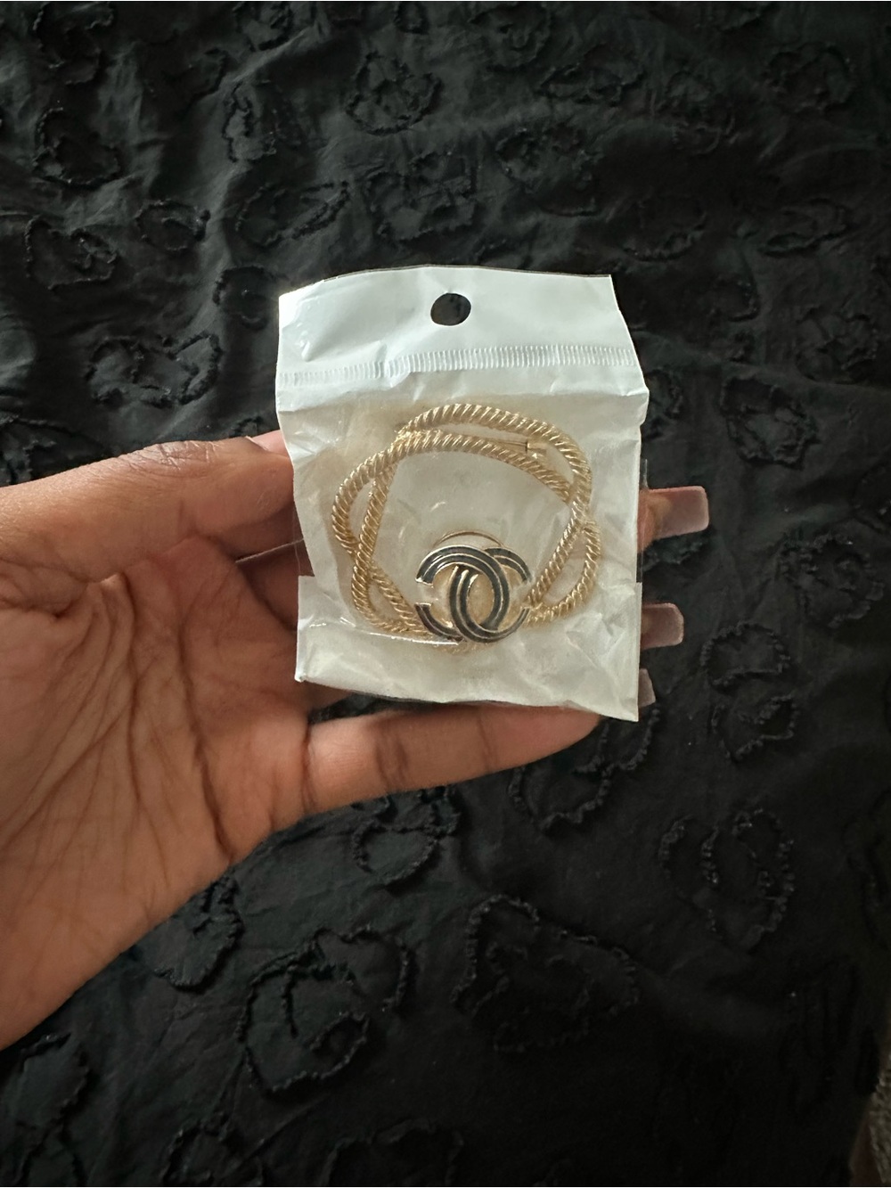 Gold cc brooch for clothes